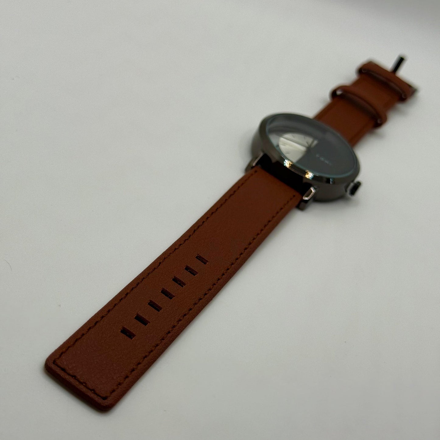 TOMI transparent dial with brown leather strap