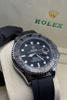 Rolex submariner strap with silver rotating & black dial date just