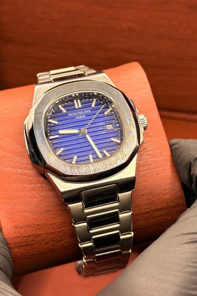 pp silver with blue dial with date
