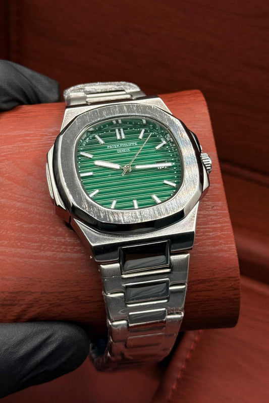 pp silver with green dial with date