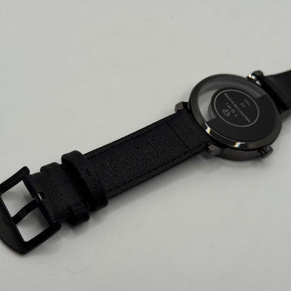 TOMI transparent dial with black leather strap