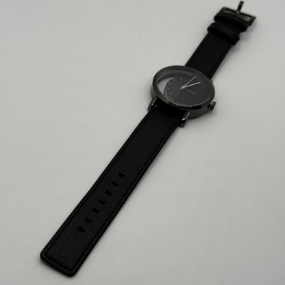 TOMI transparent dial with black leather strap