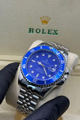Rolex submariner silver with blue rotating dial with date